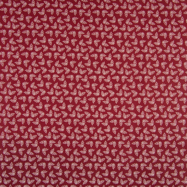 Baumwolle ~ Blätter von Stechpalme auf Rot